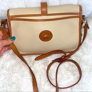 Dooney & Bourke vintage cream crossbody bag